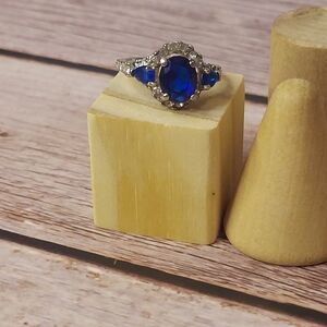 Elegant Silver Colored and Blue Stone Ring